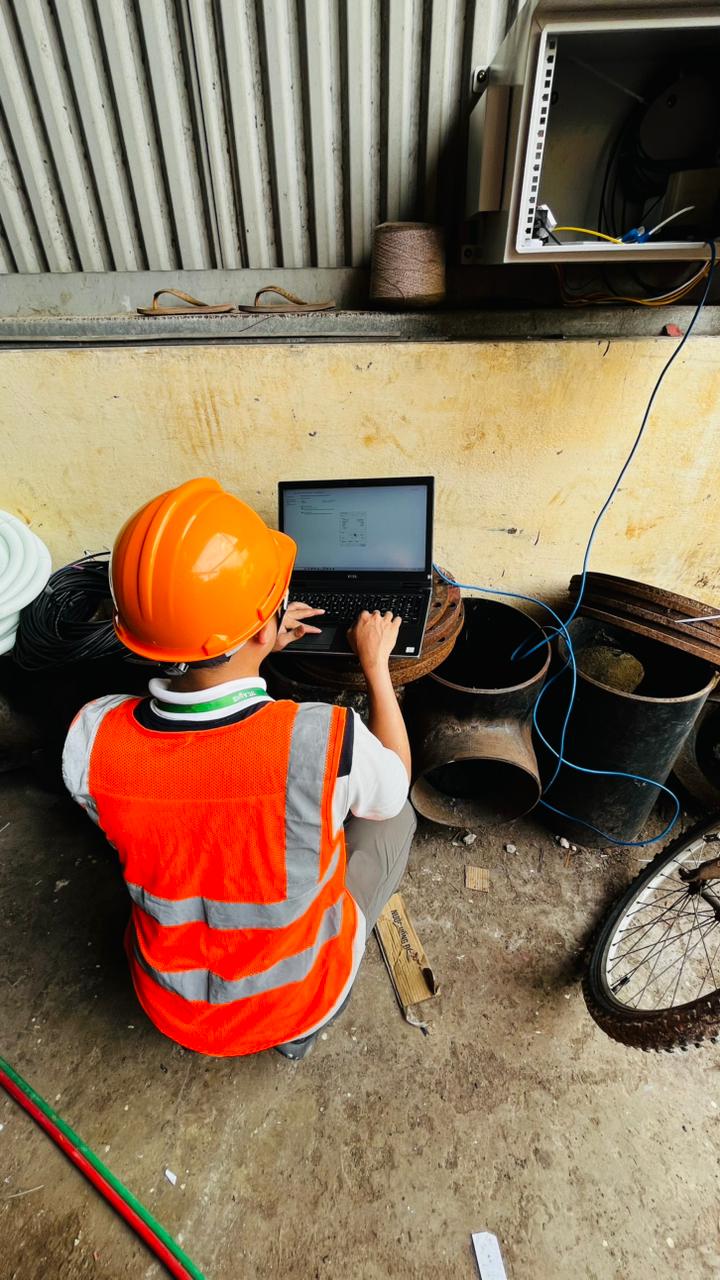 Flowmetric engineer reviewing a water risk assessment on site